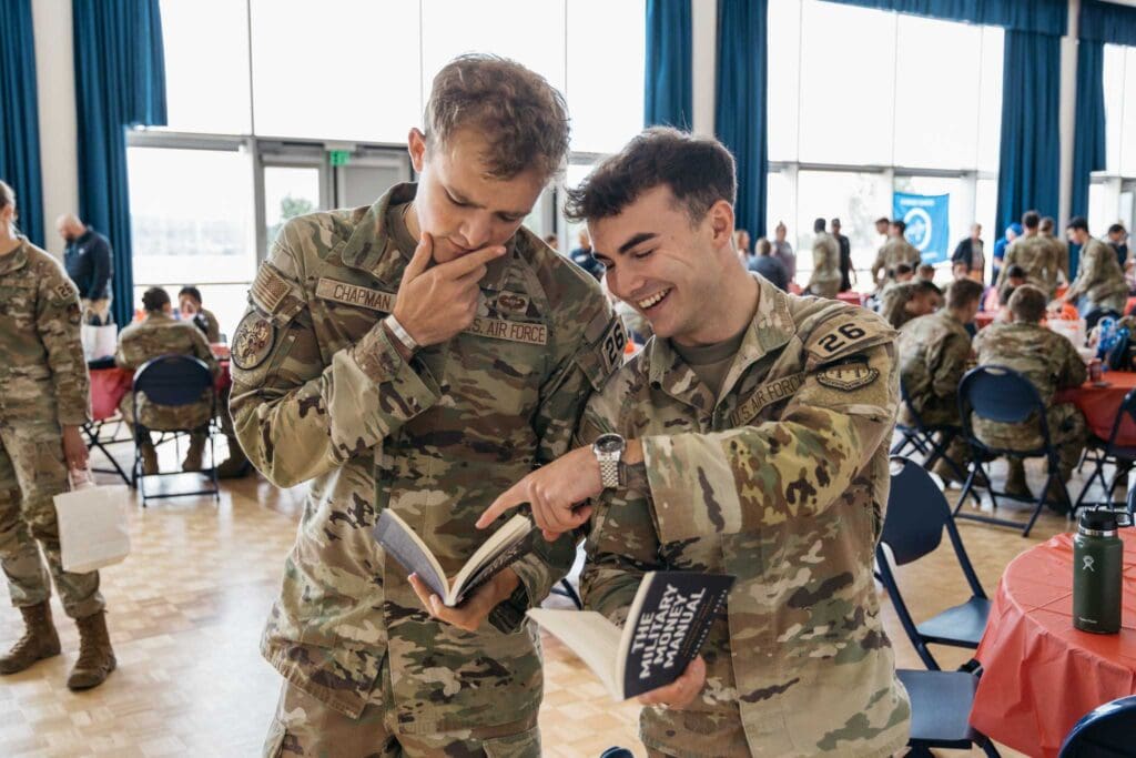 Airmen reading the manual